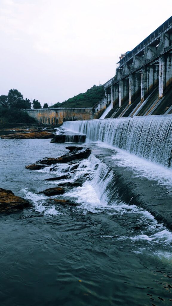 A peaceful scene of Tenu Dam with cascading water in Jharkhand, India, showcasing natural beauty and engineering.